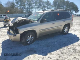 2004 GMC Envoy SLT with VIN 1GKDS13S942169804, listed as a Copart auction lot 47439305 with 240,348 mi miles and Salvage Title. Bid and sale history available at carsss.com. Image 1.