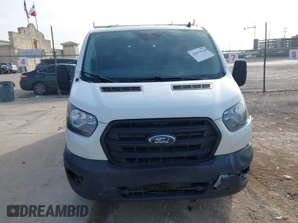 2020 Ford Transit Cargo z VIN 1FTYE1Y82LKB45974, wystawiony jako IAAI lot #42614744 z przebiegiem 200 241 mil mil oraz . Historia ofert i sprzedaży dostępna na DreamBid. Obrazek 12.