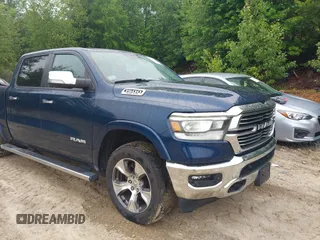 2022 Ram 1500 Laramie with VIN 1C6SRFJT0NN300228, listed as a IAAI auction lot 42502186 with 57,472 mi miles and . Bid and sale history available at DreamBid. Image 1.
