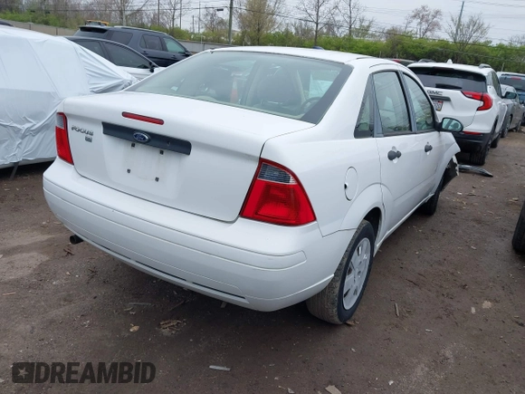 2007 Ford Focus S z VIN 1FAHP34N07W260725, wystawiony jako IAAI lot #42004694 z przebiegiem 84 923 mil mil oraz . Historia ofert i sprzedaży dostępna na DreamBid. Obrazek 4.