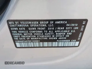 2013 Volkswagen Passat Wolfsburg Edition with VIN 1VWAH7A37DC132561, listed as a IAAI auction lot 41913353 with 125,709 mi miles and . Bid and sale history available at DreamBid. Image 9.