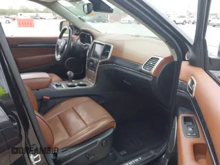 2015 Jeep Grand Cherokee Summit z VIN 1C4RJFJT0FC674494, wystawiony jako IAAI lot #42056835 z przebiegiem 143 969 mil mil oraz . Historia ofert i sprzedaży dostępna na DreamBid. Obrazek 5.