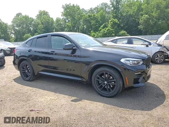 2021 BMW X4 xDrive30i with VIN 5UX2V1C09M9E03411, listed as a Copart auction lot 62078545 with 49,101 mi miles and Salvage title. Bid and sale history available at DreamBid. Image 14.