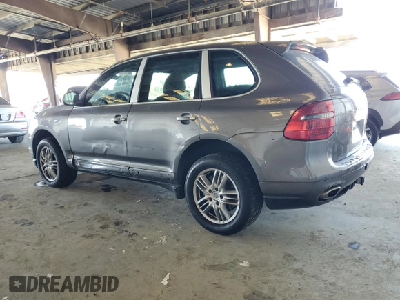 2010 Porsche Cayenne with VIN WP1AB2AP0ALA50336, listed as a Copart auction lot 62089865 with 153,942 mi miles and Salvage title. Bid and sale history available at DreamBid. Image 2.