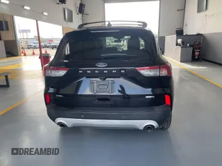 2020 Ford Escape SEL with VIN 1FMCU9H69LUA59992, listed as a IAAI auction lot 42843751 with 87,913 mi miles and . Bid and sale history available at DreamBid. Image 4.