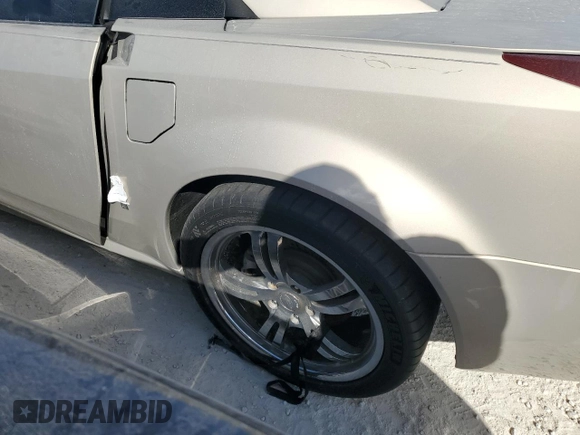 2006 Cadillac XLR z VIN 1G6YV36AX65603381, wystawiony jako Copart lot #77526894 z przebiegiem Nie podano mil oraz Nie do naprawy. Historia ofert i sprzedaży dostępna na DreamBid. Obrazek 12.
