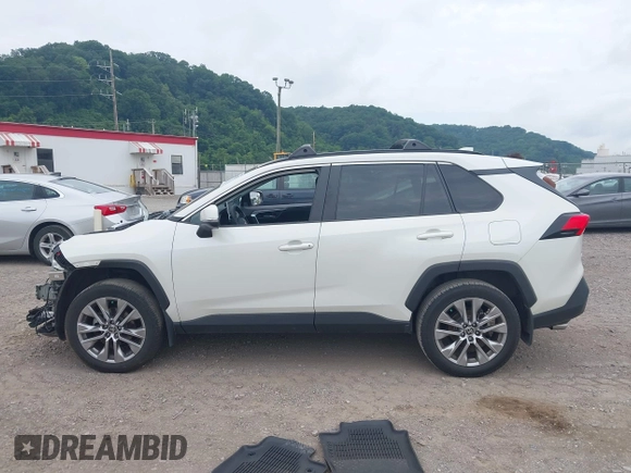 2022 Toyota RAV4 XLE Premium z VIN 2T3A1RFV4NW287421, wystawiony jako IAAI lot #42602371 z przebiegiem 59 294 mil mil oraz . Historia ofert i sprzedaży dostępna na DreamBid. Obrazek 14.
