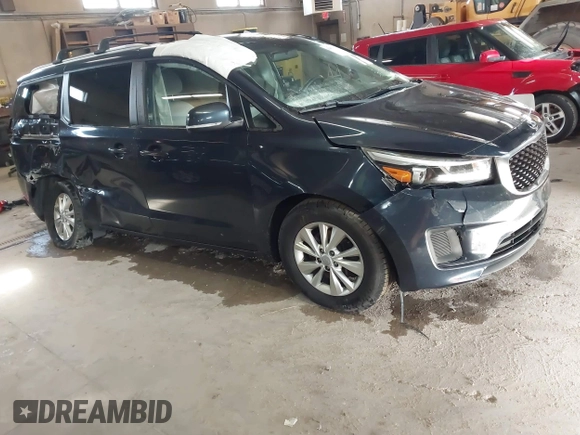 2016 Kia Sedona LX with VIN KNDMB5C10G6161548, listed as a IAAI auction lot 41957535 with 130,228 mi miles and . Bid and sale history available at DreamBid. Image 1.