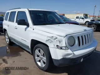 2011 Jeep Patriot Latitude with VIN 1J4NT1GB5BD245263, listed as a IAAI auction lot 41942376 with 215,147 mi miles. Bid and sale history available at carsss.com. Image 6.