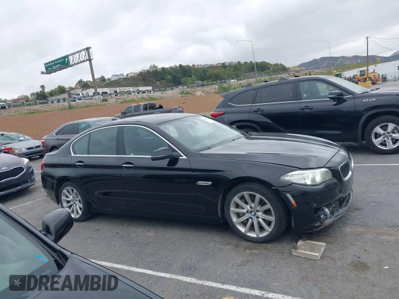 2015 BMW 5 Series 535i with VIN WBA5B1C55FD922761, listed as a IAAI auction lot 42021799 with 118,592 mi miles and . Bid and sale history available at carsss.com. Image 13.