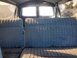 1991 Chevrolet Suburban z VIN 1GNGV26K1MF104219, wystawiony jako Copart lot #87527045 z przebiegiem 189 345 mil mil oraz Czysty tytuł • Clean title. Historia ofert i sprzedaży dostępna na DreamBid. Obrazek 10.