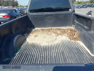 1999 Ford F-150 Work Series with VIN 1FTZX1721XKA82769, listed as a IAAI auction lot 41966574 with 190,289 mi miles. Bid and sale history available at carsss.com. Image 13.