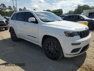 2018 Jeep Grand Cherokee High Altitude with VIN 1C4RJECG1JC260482, listed as a Copart auction lot 57310115 with 144,320 mi miles and Salvage title. Bid and sale history available at DreamBid. Image 4.