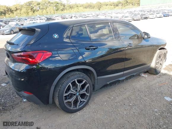 2018 BMW X2 xDrive28i with VIN WBXYJ5C33JEF78378, listed as a IAAI auction lot 40577868 with 45,592 mi miles. Bid and sale history available at carsss.com. Image 4.