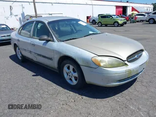 2000 Ford Taurus SES with VIN 1FAFP55U8YG234331, listed as a IAAI auction lot 42797654 with 103,742 mi miles and . Bid and sale history available at DreamBid. Image 1.