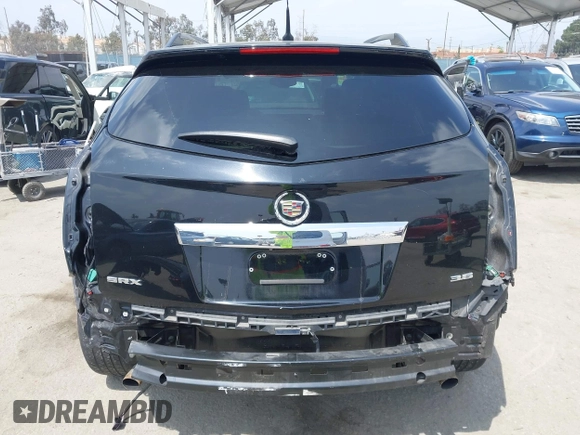 2014 Cadillac SRX Luxury Collection with VIN 3GYFNBE34ES639647, listed as a IAAI auction lot 42108140 with 99,740 mi miles and . Bid and sale history available at DreamBid. Image 17.