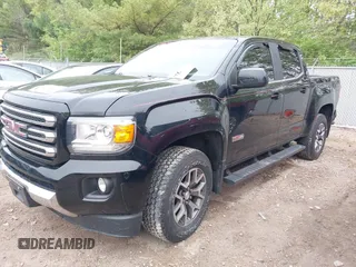 2017 GMC Canyon 4WD SLE z VIN 1GTG6CEN9H1140962, wystawiony jako IAAI lot #42251320 z przebiegiem 142 099 mil mil oraz . Historia ofert i sprzedaży dostępna na DreamBid. Obrazek 2.