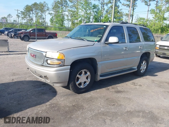 2004 GMC Yukon Denali z VIN 1GKEK63U94J249578, wystawiony jako IAAI lot #42088940 z przebiegiem 253 352 mil mil oraz . Historia ofert i sprzedaży dostępna na DreamBid. Obrazek 2.