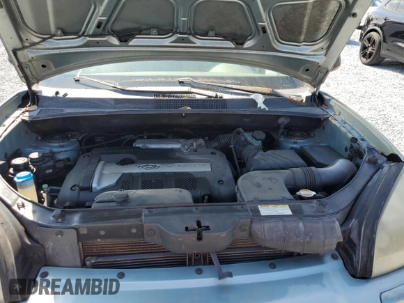 2005 Hyundai Tucson GL with VIN KM8JM12B05U151056, listed as a Copart auction lot 49132425 with 95,450 mi miles and Salvage Title. Bid and sale history available at carsss.com. Image 12.