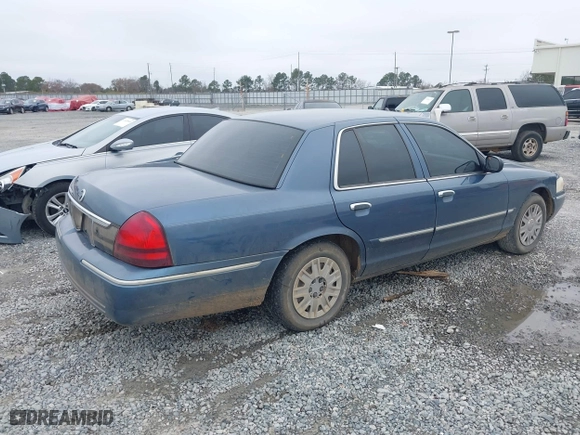2007 Mercury Grand Marquis GS with VIN 2MEFM74V27X609128, listed as a IAAI auction lot 41474359 with 99,050 mi miles. Bid and sale history available at carsss.com. Image 4.