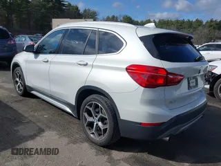 2019 BMW X1 xDrive28i with VIN WBXHT3C56K5L35842, listed as a IAAI auction lot 41981409 with 54,325 mi miles. Bid and sale history available at carsss.com. Image 3.