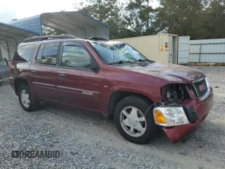 2003 GMC Envoy SLE with VIN 1GKET16P836243276, listed as a Copart auction lot 74170594 with 182,555 mi miles and Salvage Title. Bid and sale history available at DreamBid. Image 4.