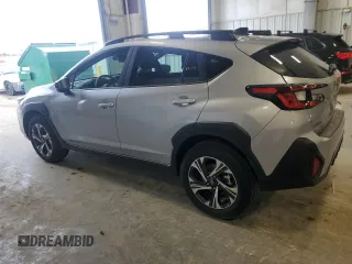 2024 Subaru Crosstrek Premium с VIN JF2GUADC8R8372649, выставлен на аукционе Copart как лот 54797205 с пробегом 5 736 миль миль и Списание • Salvage title. История ставок и продаж доступна на DreamBid. Изображение 2.