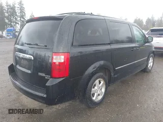 2009 Dodge Grand Caravan SXT with VIN 2D8HN54119R569142, listed as a IAAI auction lot 42000421 with 161,717 mi miles and . Bid and sale history available at DreamBid. Image 4.
