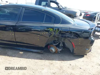 2019 Dodge Charger R/T with VIN 2C3CDXCT2KH575297, listed as a IAAI auction lot 41661339 with 119,854 mi miles and . Bid and sale history available at DreamBid. Image 17.