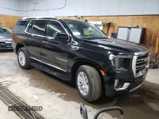2024 GMC Yukon SLT with VIN 1GKS2BKDXRR331079, listed as a Copart auction lot 79533764 with 8,233 mi miles and Clean Title. Bid and sale history available at carsss.com. Image 4.