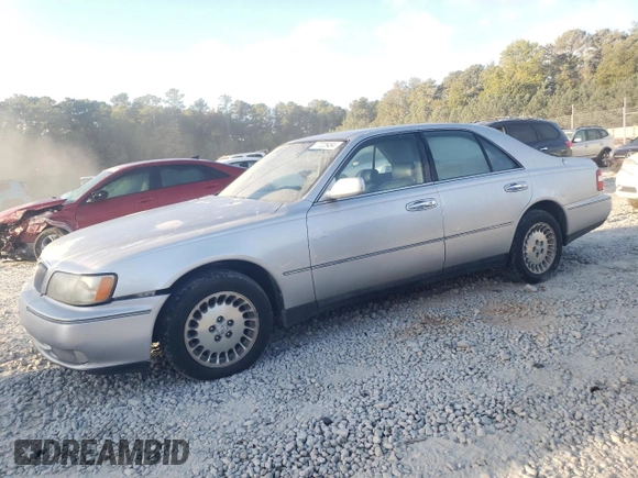 1998 Infiniti Q45 z VIN JNKBY31A9WM400536, wystawiony jako Copart lot #77225484 z przebiegiem 136 342 mil mil oraz Szkody całkowita. Historia ofert i sprzedaży dostępna na DreamBid. Obrazek 1.