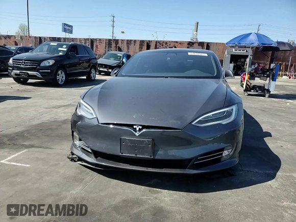 2019 Tesla Model S 75D with VIN 5YJSA1E2XKF305595, listed as a Copart auction lot 51838965 with Not provided miles and Salvage title. Bid and sale history available at DreamBid. Image 11.