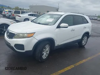 2011 Kia Sorento LX with VIN 5XYKTDA23BG060231, listed as a IAAI auction lot 42142538 with 166,884 mi miles. Bid and sale history available at carsss.com. Image 2.