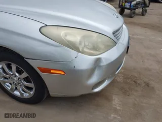 2003 Lexus ES 300 with VIN JTHBF30G736004651, listed as a IAAI auction lot 42082023 with 221,653 mi miles. Bid and sale history available at carsss.com. Image 12.