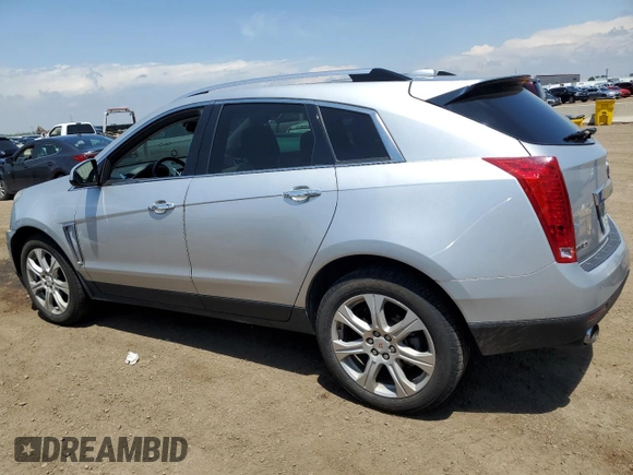2015 Cadillac SRX Performance Collection with VIN 3GYFNCE37FS585204, listed as a Copart auction lot 59966935 with 50,781 mi miles and Salvage title. Bid and sale history available at DreamBid. Image 2.