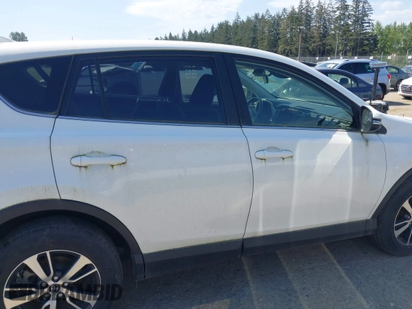 2018 Toyota RAV4 XLE with VIN JTMWFREV3JD130995, listed as a IAAI auction lot 42183630 with 56,624 mi miles. Bid and sale history available at carsss.com. Image 14.