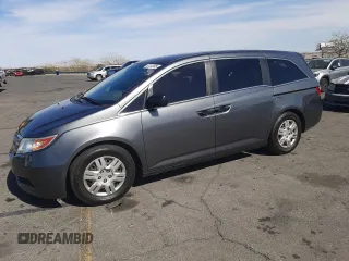 2012 Honda Odyssey LX with VIN 5FNRL5H24CB019934, listed as a Copart auction lot 52412605 with 157,725 mi miles and Salvage Title. Bid and sale history available at carsss.com. Image 1.