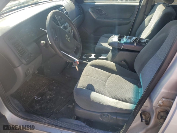 2003 Mazda Tribute LX with VIN 4F2YZ04143KM25953, listed as a Copart auction lot 45001105 with 133,287 mi miles and Salvage Title. Bid and sale history available at carsss.com. Image 7.
