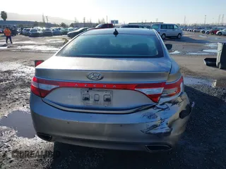 2013 Hyundai Azera z VIN KMHFH4JG3DA230844, wystawiony jako IAAI lot #41817997 z przebiegiem 129 163 mil mil oraz . Historia ofert i sprzedaży dostępna na DreamBid. Obrazek 17.