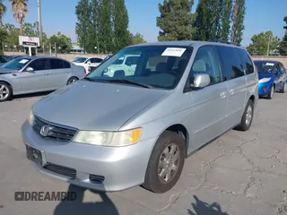 2004 Honda Odyssey EX-RES z VIN 5FNRL18864B149213, wystawiony jako IAAI lot #42227096 z przebiegiem 182 145 mil mil oraz . Historia ofert i sprzedaży dostępna na DreamBid. Obrazek 6.