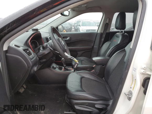 2021 Jeep Compass Trailhawk with VIN 3C4NJDDB5MT590369, listed as a Copart auction lot 46107685 with 67,857 mi miles and Salvage title. Bid and sale history available at DreamBid. Image 7.