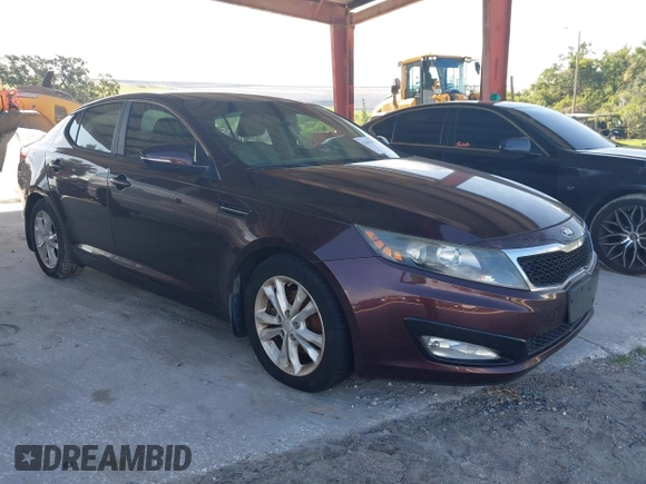 2013 Kia Optima EX z VIN 5XXGN4A71DG142137, wystawiony jako IAAI lot #42681081 z przebiegiem 115 892 mil mil oraz . Historia ofert i sprzedaży dostępna na DreamBid. Obrazek 1.