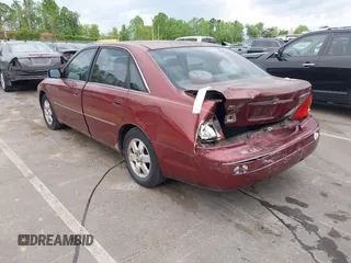 2000 Toyota Avalon XL with VIN 4T1BF28B3YU095209, listed as a IAAI auction lot 42008138 with 276,894 mi miles and . Bid and sale history available at DreamBid. Image 3.