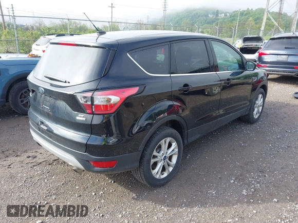 2017 Ford Escape SE with VIN 1FMCU9GD0HUC62616, listed as a IAAI auction lot 42194561 with 97,897 mi miles and . Bid and sale history available at DreamBid. Image 4.