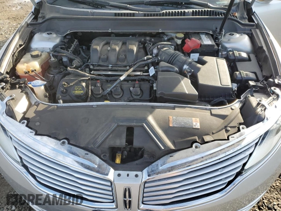 2014 Lincoln MKZ with VIN 3LN6L2JKXER806539, listed as a Copart auction lot 42724215 with 104,283 mi miles and Salvage title. Bid and sale history available at DreamBid. Image 11.