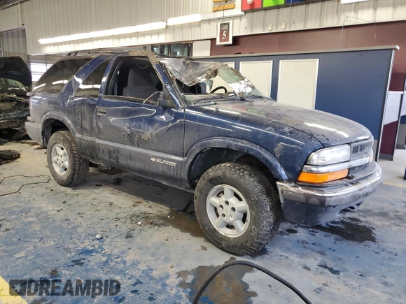 2000 Chevrolet Blazer LS z VIN 1GNCT18WXYK132399, wystawiony jako Copart lot #87880555 z przebiegiem 89 350 mil mil oraz Czysty tytuł • Clean title. Historia ofert i sprzedaży dostępna na DreamBid. Obrazek 4.