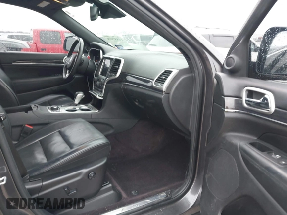 2016 Jeep Grand Cherokee High Altitude with VIN 1C4RJFCG7GC316309, listed as a IAAI auction lot 41557459 with 144,700 mi miles. Bid and sale history available at carsss.com. Image 5.