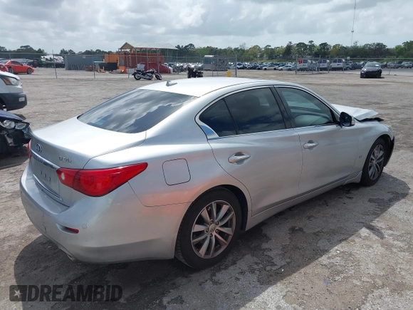 2014 Infiniti Q50 Premium z VIN JN1BV7AP9EM690381, wystawiony jako IAAI lot #41761562 z przebiegiem 107 099 mil mil oraz . Historia ofert i sprzedaży dostępna na DreamBid. Obrazek 4.