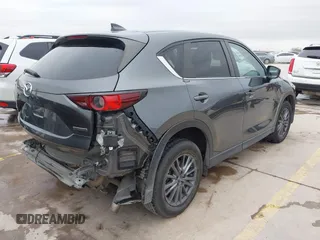 2021 Mazda CX-5 Touring with VIN JM3KFBCM0M0342210, listed as a IAAI auction lot 41236013 with 96,012 mi miles. Bid and sale history available at carsss.com. Image 4.