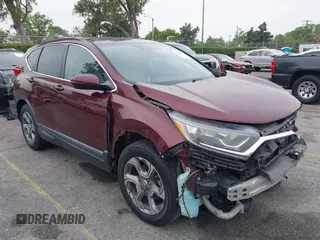 2017 Honda CR-V EX-L z VIN 7FARW1H88HE012355, wystawiony jako IAAI lot #42349378 z przebiegiem 131 959 mil mil oraz . Historia ofert i sprzedaży dostępna na DreamBid. Obrazek 1.